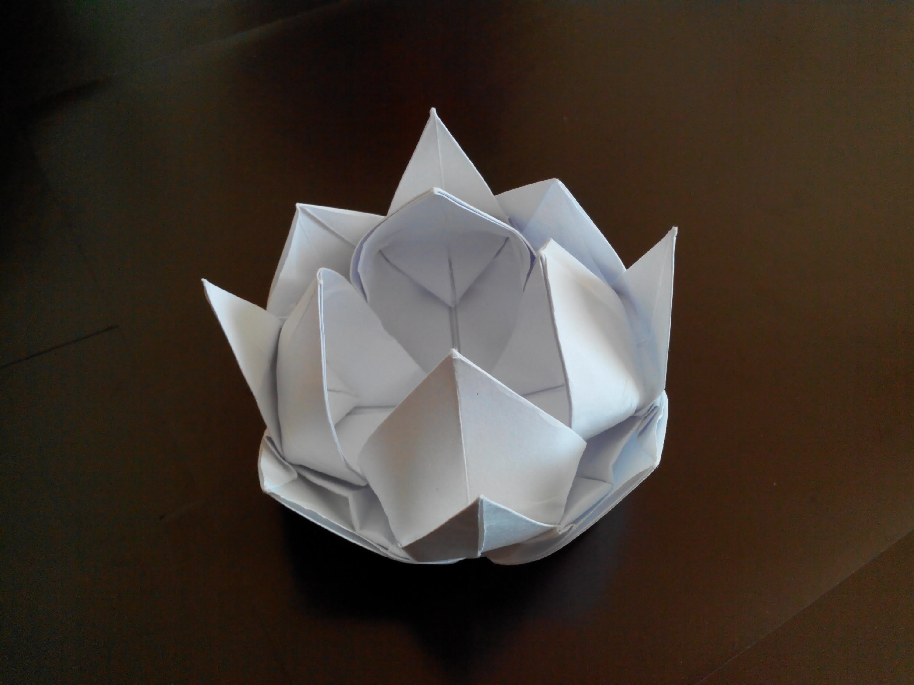 Видео оригами цветок крокус. Цветы оригами Лотус. Оригами кувшинка (Лотос). Оригами из бумаги цветок лотоса. Оригами Лотос из бумаги.