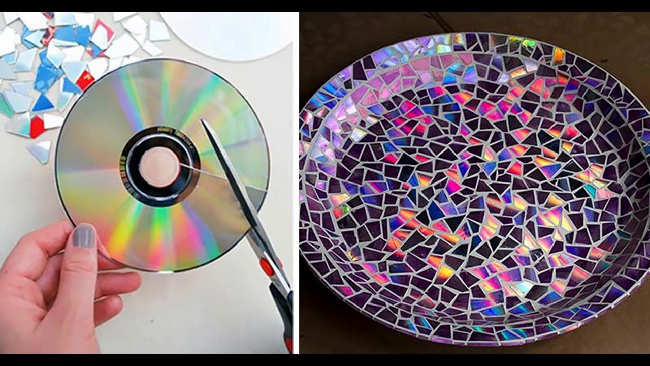 Много использованных дисков. Панно из дисков. Поделки из дисков. Украшения из дисков. Украшение интерьера из дисков.