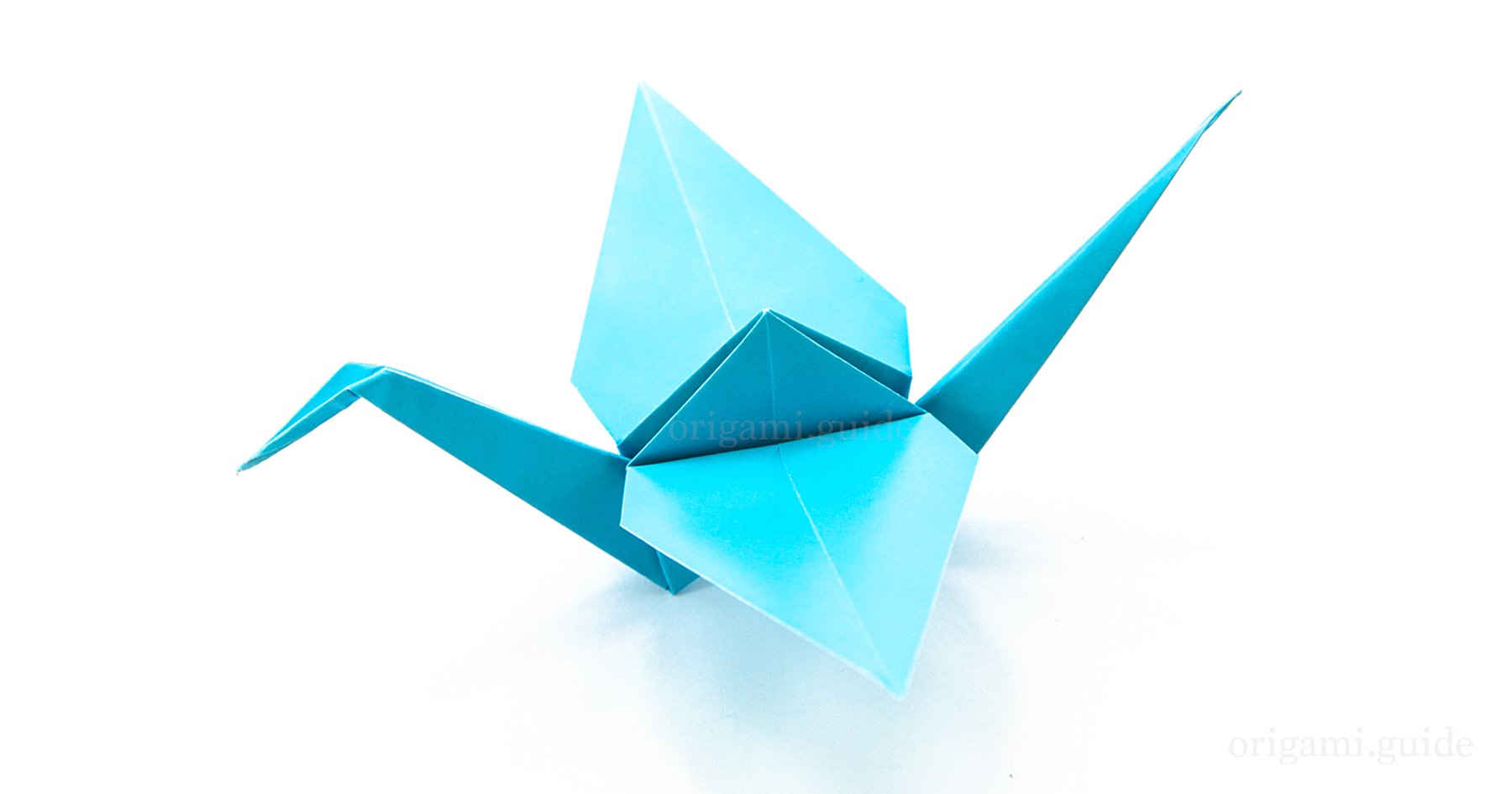 Оригами журавлик простой способ. Журавлик Цуру. Оригами. Журавль оригами. Бумажный журавль оригами.