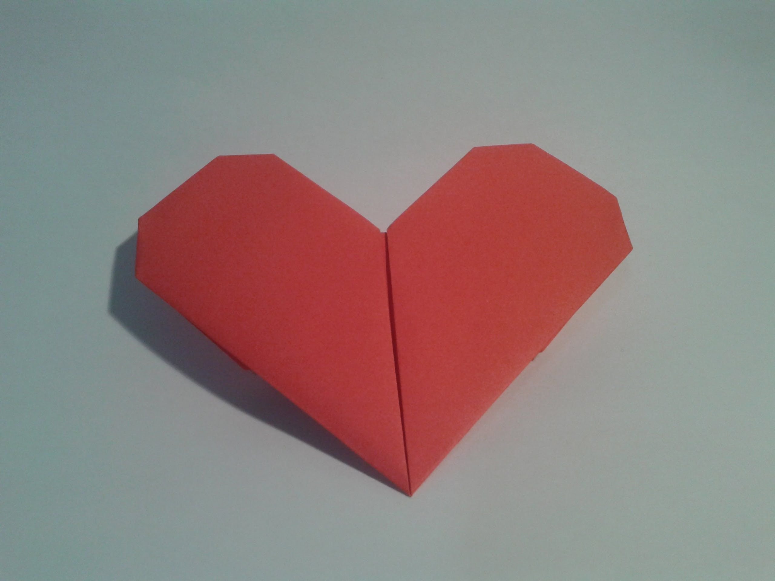 Легкие сердечки из бумаги. Оригами сердце. Оригами сердечко. Объемные сердечки. Сердце из оригами.