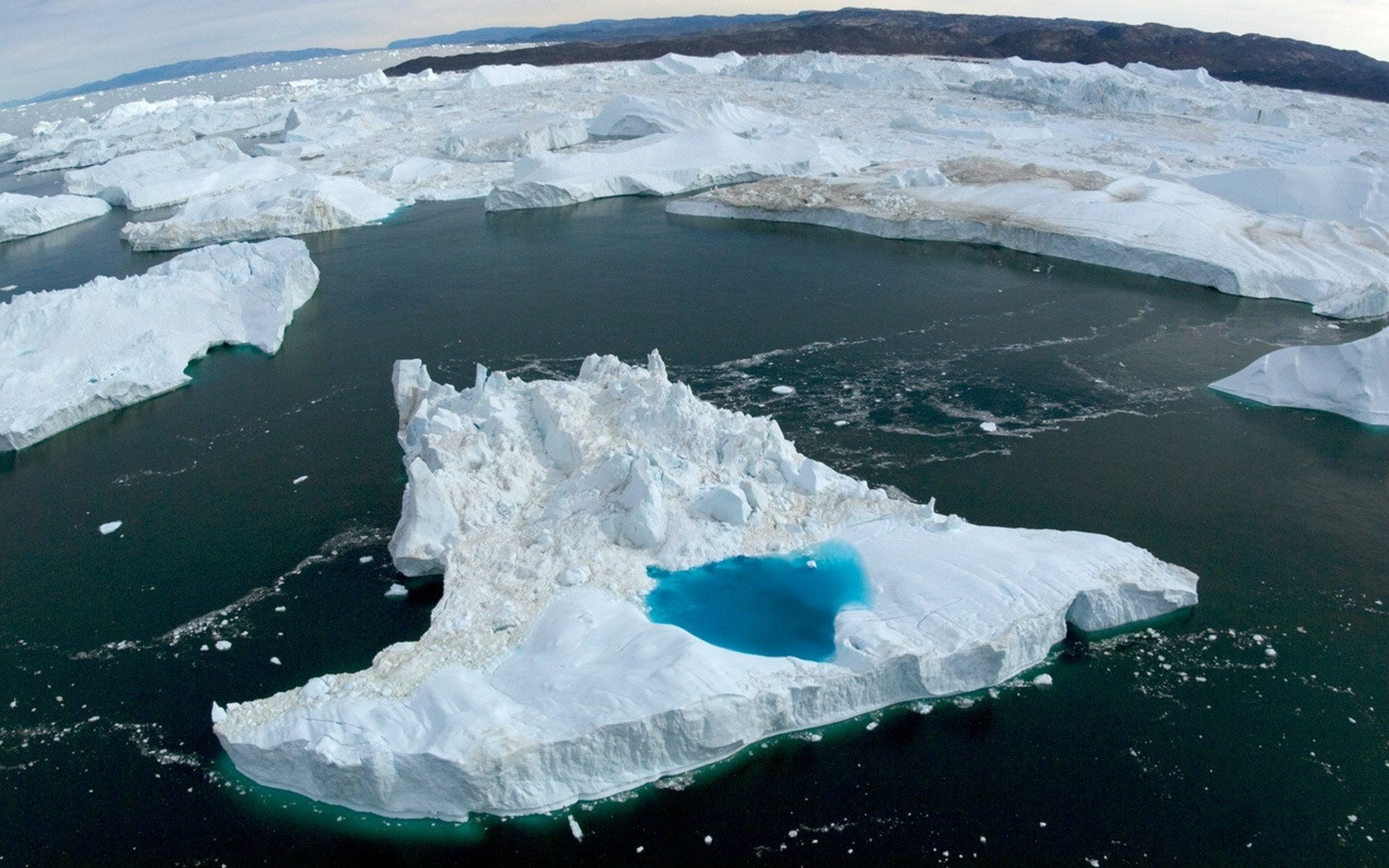 Крупнейшее антарктическое. Ледник Якобсхавн Гренландия. Айсберги Антарктиды. Антарктида ледник Беллинсгаузена. Ледники айсберги Антарктиды.